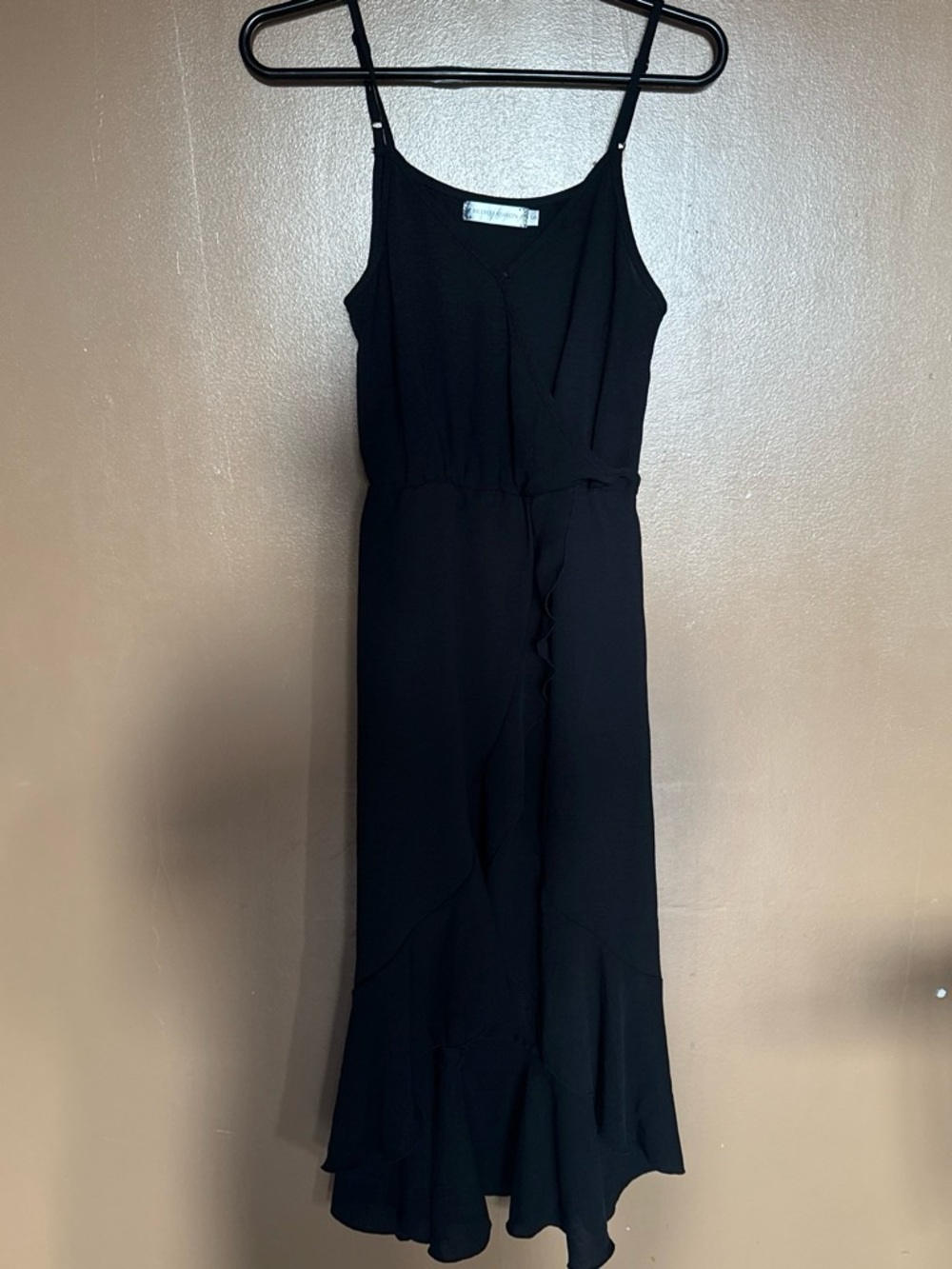 Sleeveless Black Maxi Dress with Ruffle Hem